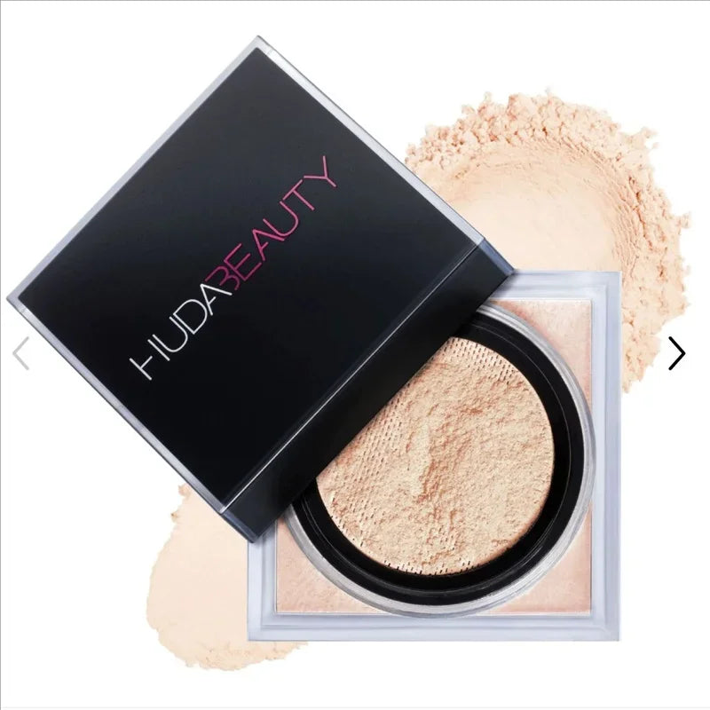 Huda Beauty – Base Líquida Impecable en Polvo de Larga Duración